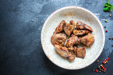 liver cream stew, creamy sauce (chicken liver, healthy diet eating) keto or paleo diet menu concept background. top view. copy space for text