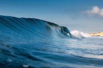 Ocean ideal wave in ocean. Breaking blue wave