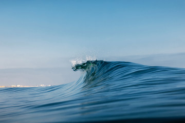 Ocean ideal wave in ocean. Breaking blue wave