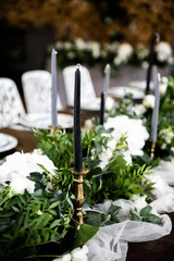 Festive banquet decorated with green branches