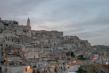 Naklejka premium Landscape of the Sassi di Matera, Italy. Ancient cave dwellings inhabited since the Paleolithic period.