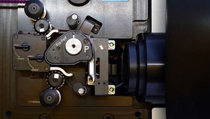 Fototapeta na wymiar 35 mm film scanner in cinemas with industrial film. 