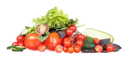 Obraz na płótnie Canvas Fresh different red tomatoes, green cucumbers, purple and green basil and sage leaves isolated on white background. Ingredients for vegetable salad