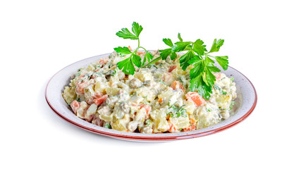 The vinaigrette of various boiled vegetables in the plate on white