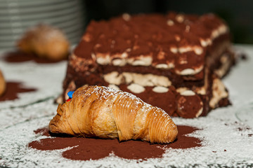 Sfogliatella, typical Neapolitan pastry, with yellow cream and strawberry, Naples, Italy