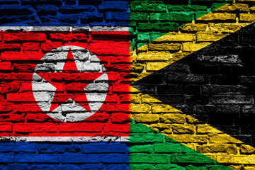 Flag of North Korea and Jamaica on brick wall