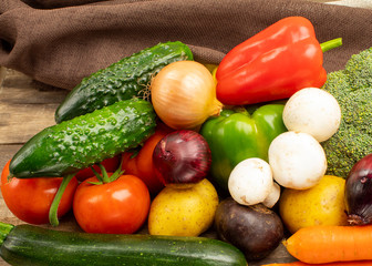 Homemade vegetables on a wooden background view from the side