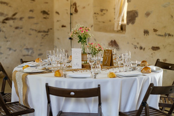 Restaurant table set for a banquet or for a wedding