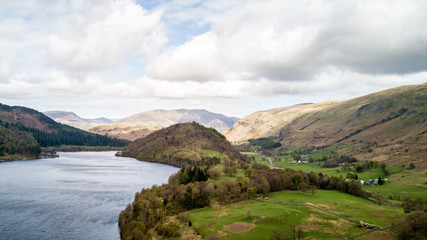 Fototapeta na wymiar Thirlmere and Great How, Lake District, England. Aerial view over Thirlmere reservoir with the mound of Great How in the centre of the frame.