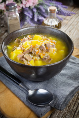 Polish barley soup with vegetables and chicken heart.