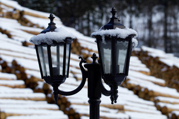  Snowy lamps and wooden logs