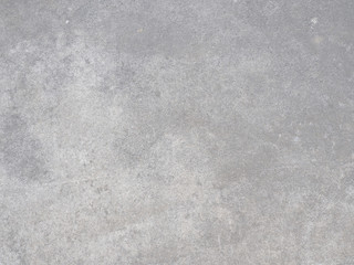 Grey dirty cement wall used for background.