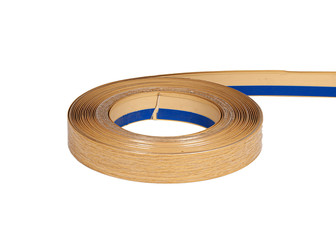 Roll of wooden decorative plastic rubber tape ribbon with adhesive isolated on white background