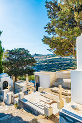 Greek orthodox graveyard. Ancient grave on the cemetery in Lefkes, Paros, Greece