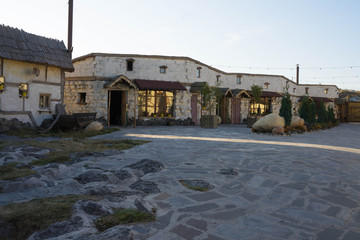 a small courtyard with stone pavement and stone houses