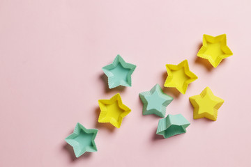 Colorful silicone cupcake cases on a pink background