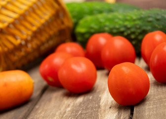 Tomatoes on a wooden background side view