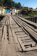 Fototapeta na wymiar Village of Chavin Andes Peru. Wooden Bridge 