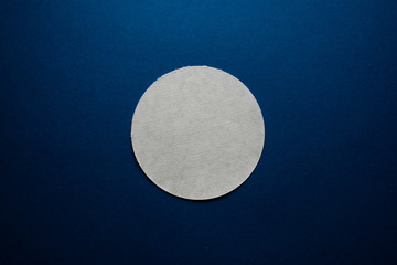 gray paper circle on dark blue, chart concept, whole part