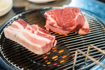 Preparing Traditional Korean Barbecue Grill Pork.
