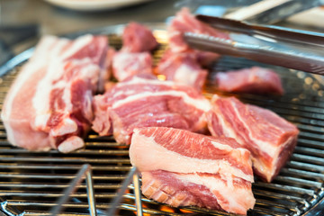 Preparing Traditional Korean Barbecue Grill Pork.