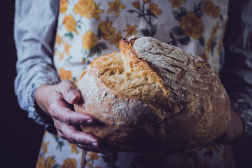 girl holding fresh white bread