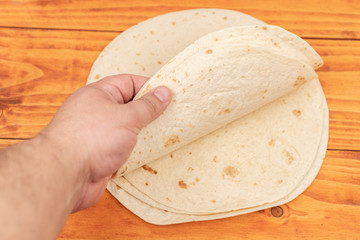 Empty tortillas package on the wooden table