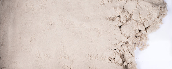 Kinetic sand scattered all over the background