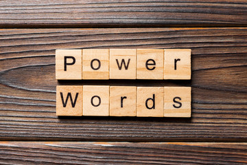 POWER WORDS word written on wood block. POWER WORDS text on table, concept