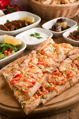 Turkish chicken pide with garnitures