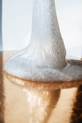 glitter slime transparent flexible viscous. game for children. antistress. beautiful background
