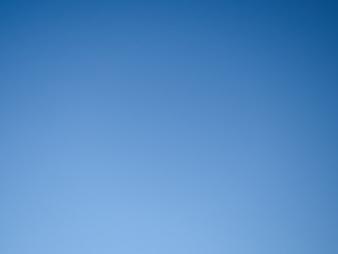 background, blue cloudless sky with gradient transitions