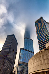 Obraz na płótnie Canvas Chicago skyscrapers, steel, glass and old brick buildings