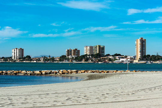 View of the Mar Menor, at Lo Pagan, Spain.  White sand beaches sloping to the calm waters of the Mediterranean sea. 