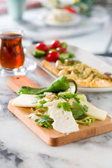 cheese plate with bread and tea