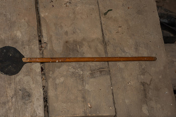 Homemade vintage fly swatter on old boards