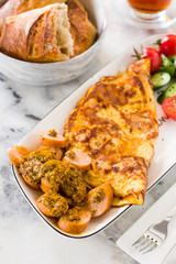 scrambled egg with sausage and bread