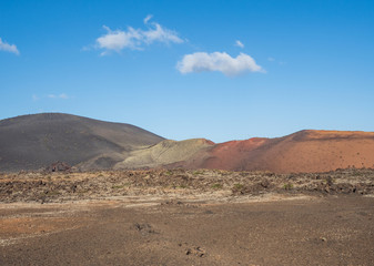 Fototapeta na wymiar Volcanic landscape of Timanfaya National Park on island Lanzarote