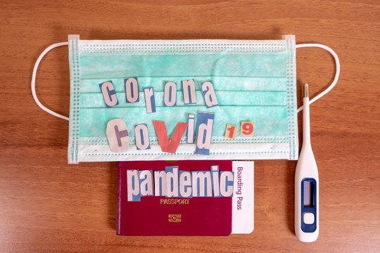 Coronavirus and travel concept. The concept of restrictions for tourism. Passport, thermomether and protective medical masks. Covid19 Corona virus disease danger pandemic spread worldwide global