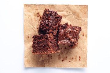 Flatlay with brownie pieces isolated on a white.