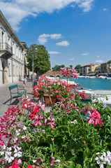 Fototapeta na wymiar Peschiera del Garda, Italy colorful promenade
