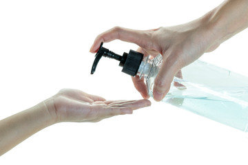Close up mom hand applying cleaning gel on child hand on isolated white background