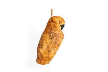 Entire traditional smoked goose breast cured close up shot isolated on white