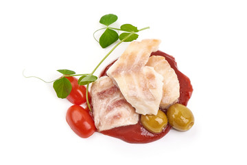 Canned fish fillet with tomato sauce, isolated on white background