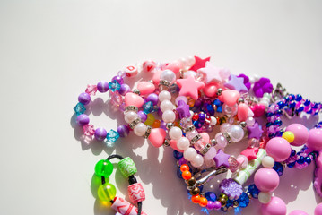bead bracelets. beads. decorations. bijouterie. hobbies of girls. background