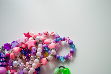 bead bracelets. beads. decorations. bijouterie. hobbies of girls. background