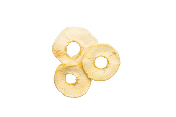 Dried apple chips on white background