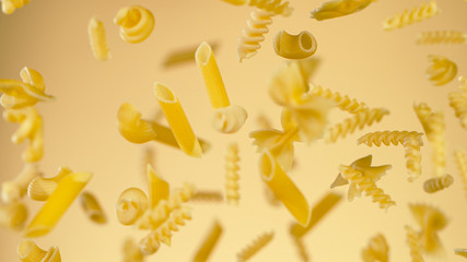 Freeze motion of flying uncooked italian pasta on golden background.