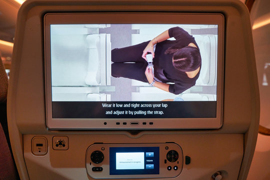 DUBAI, UAE - CIRCA JANUARY 2019: close up shot of a seat-back screen inside the cabin of a Emirates Airbus A380-800.