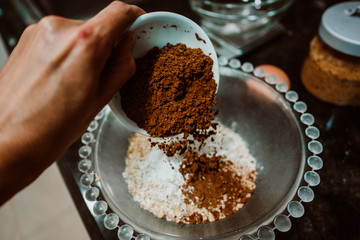 Process of mixing healthy and natural ingredients to cook at home some oatmeal, chocolate and banana cookies without refined sugar. Real food. Lifestyle